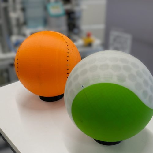 rigid (green/transparent) and soft (orange) prototypes of fizzy